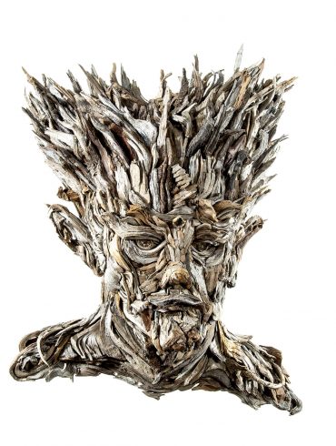 the wall hanging relief faces