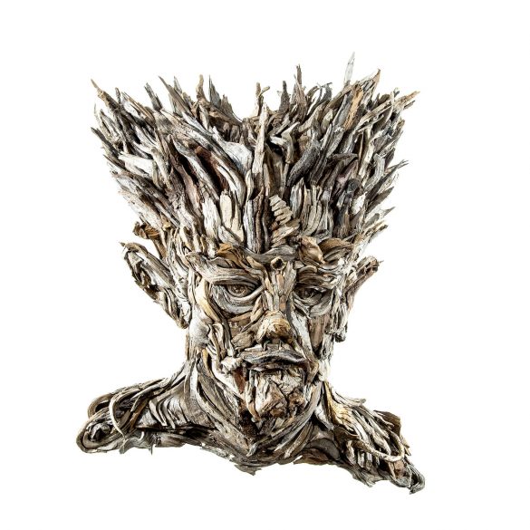 the wall hanging relief faces