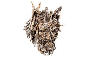 the wall hanging relief faces